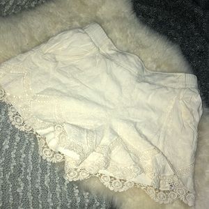 Cream embroidered shorts